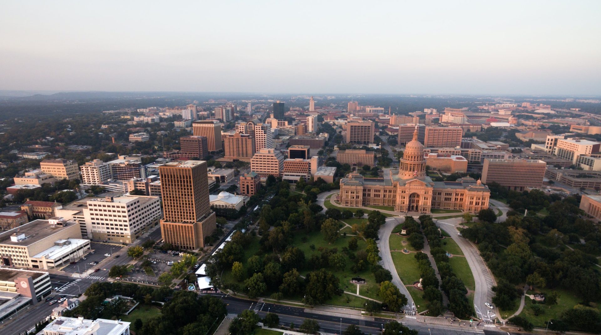 capital-building-austin-texas-government-building-blue-skies-e1625799779986.jpg